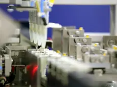 Automatisierte Dosier- und Befüllanlage für Mikroreaktorgefäße