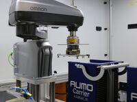 Handling flow field from tray to laser marker to process Handling flow field from tray to laser marker to process